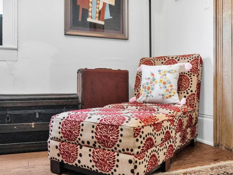 Charming vintage accent chair that adds warmth to any corner.