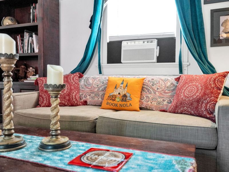 Relaxed living space w/ signature Book NOLA touches throughout.