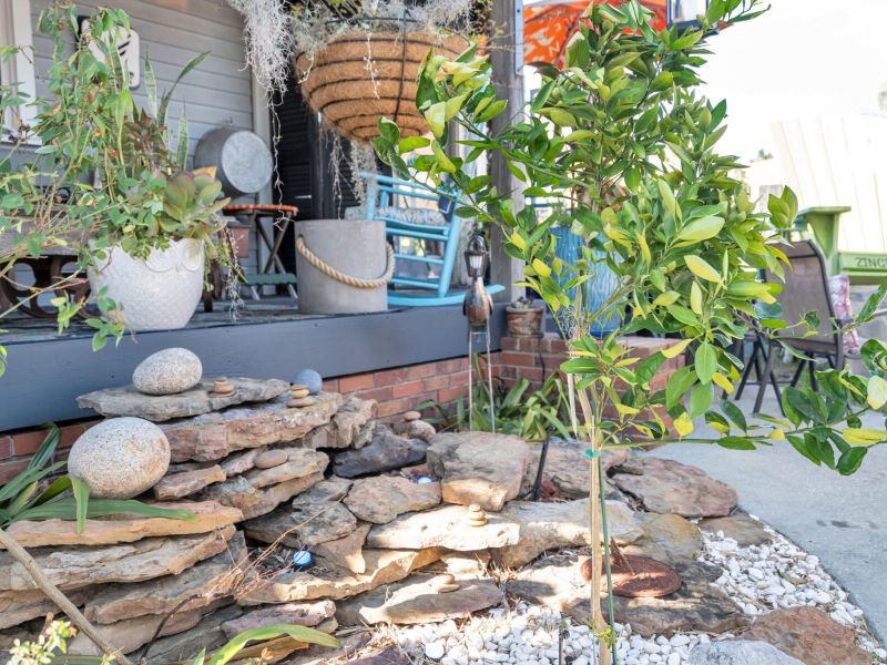 Zen garden w/ natural stone accents for a peaceful outdoor escape.