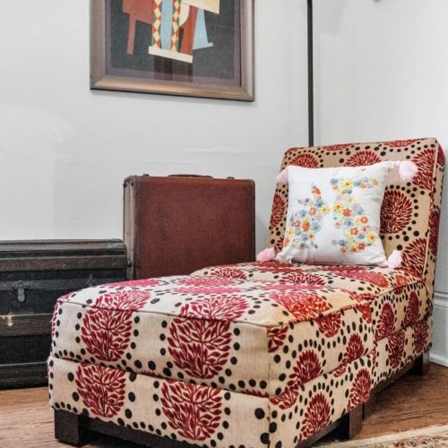 Charming vintage accent chair that adds warmth to any corner.