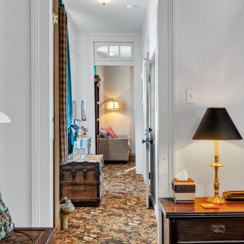 Charming entryway w/ warm vintage touches to welcome you in.