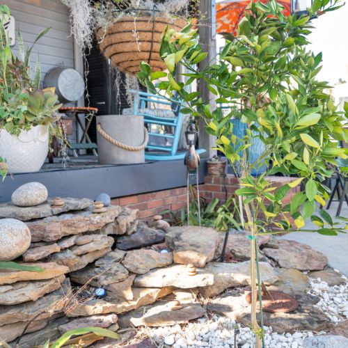 Zen garden w/ natural stone accents for a peaceful outdoor escape.