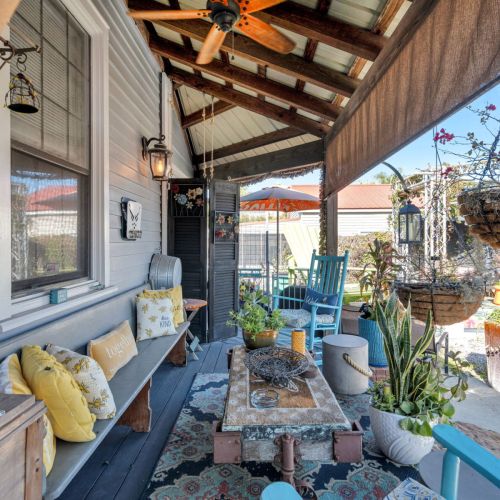 Covered porch made for slow mornings & quiet evenings.