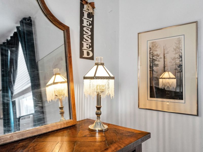 Soft lighting & charming historic accents set a relaxing mood.